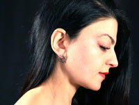 essentia diamond shaped studs