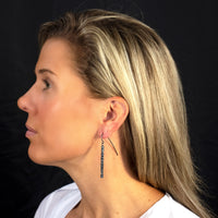 poros long vertical bar earrings